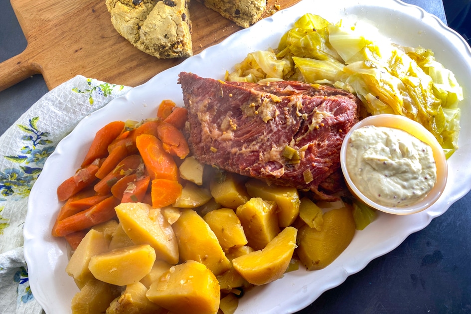 a platter of Low FODMAP corned beef with carrots and potatoes