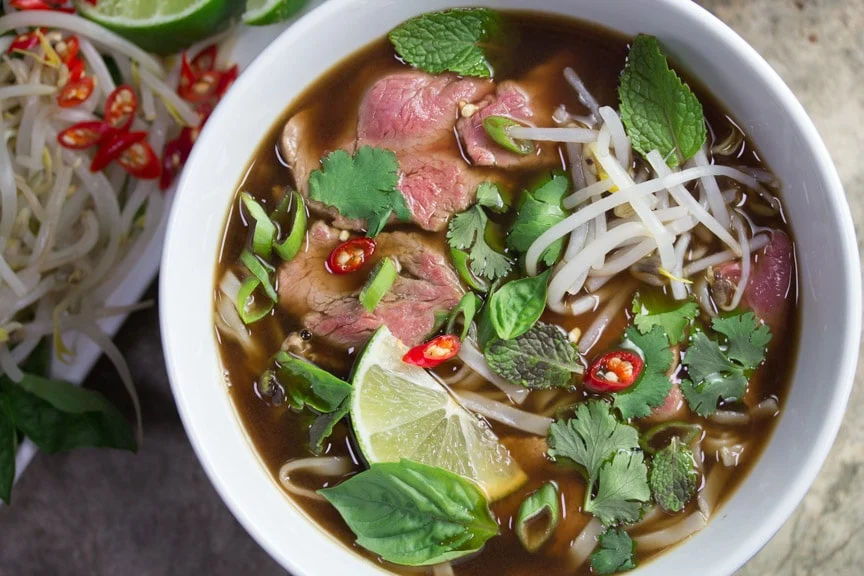 a bowl of low fodmap pho bo Vietnamese soup